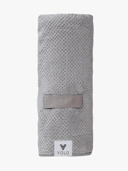 Volo Hero Hair Towel in branded component on a light gray background
